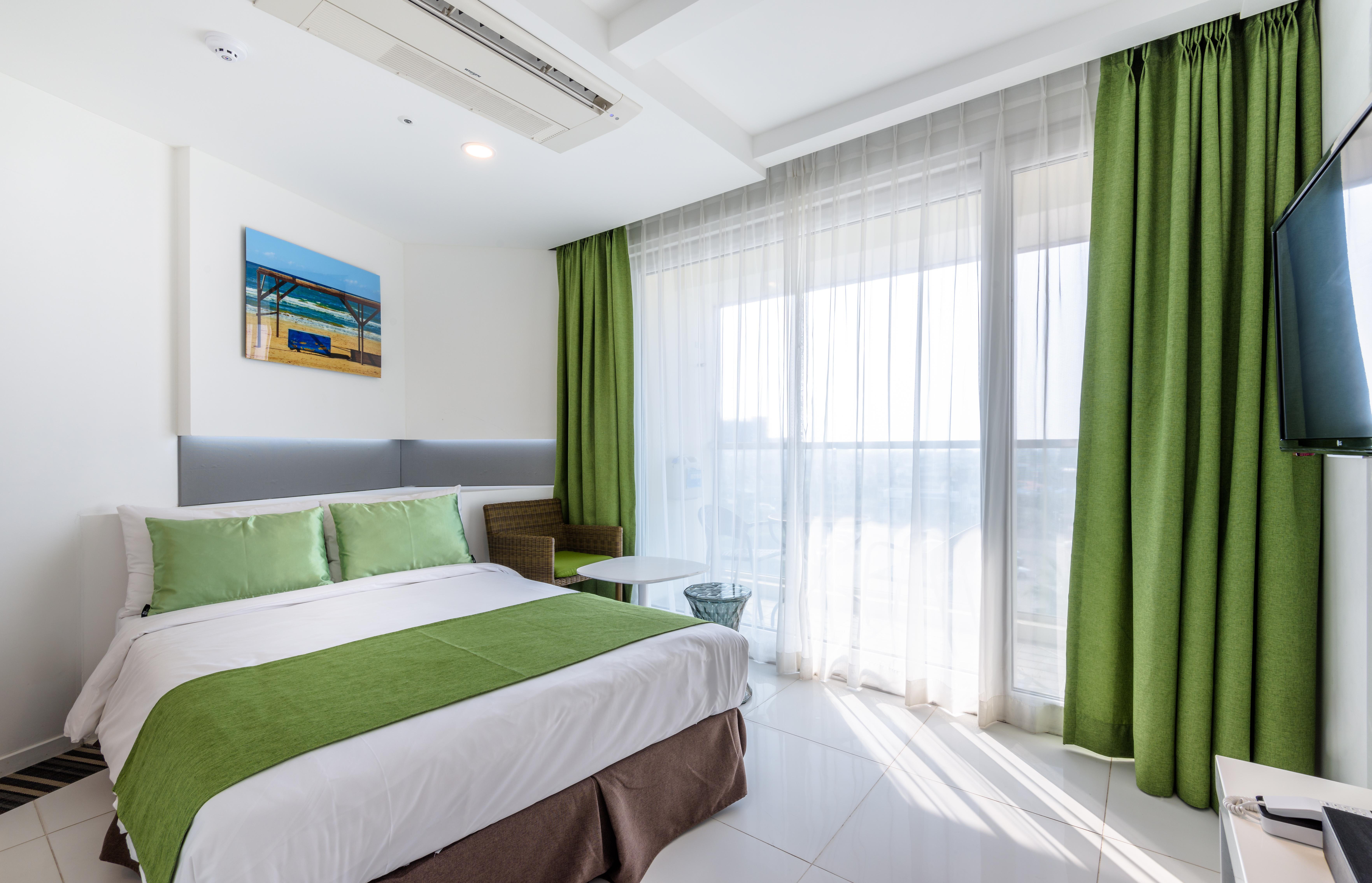 Aimi Jeju Beach Hotel Экстерьер фото