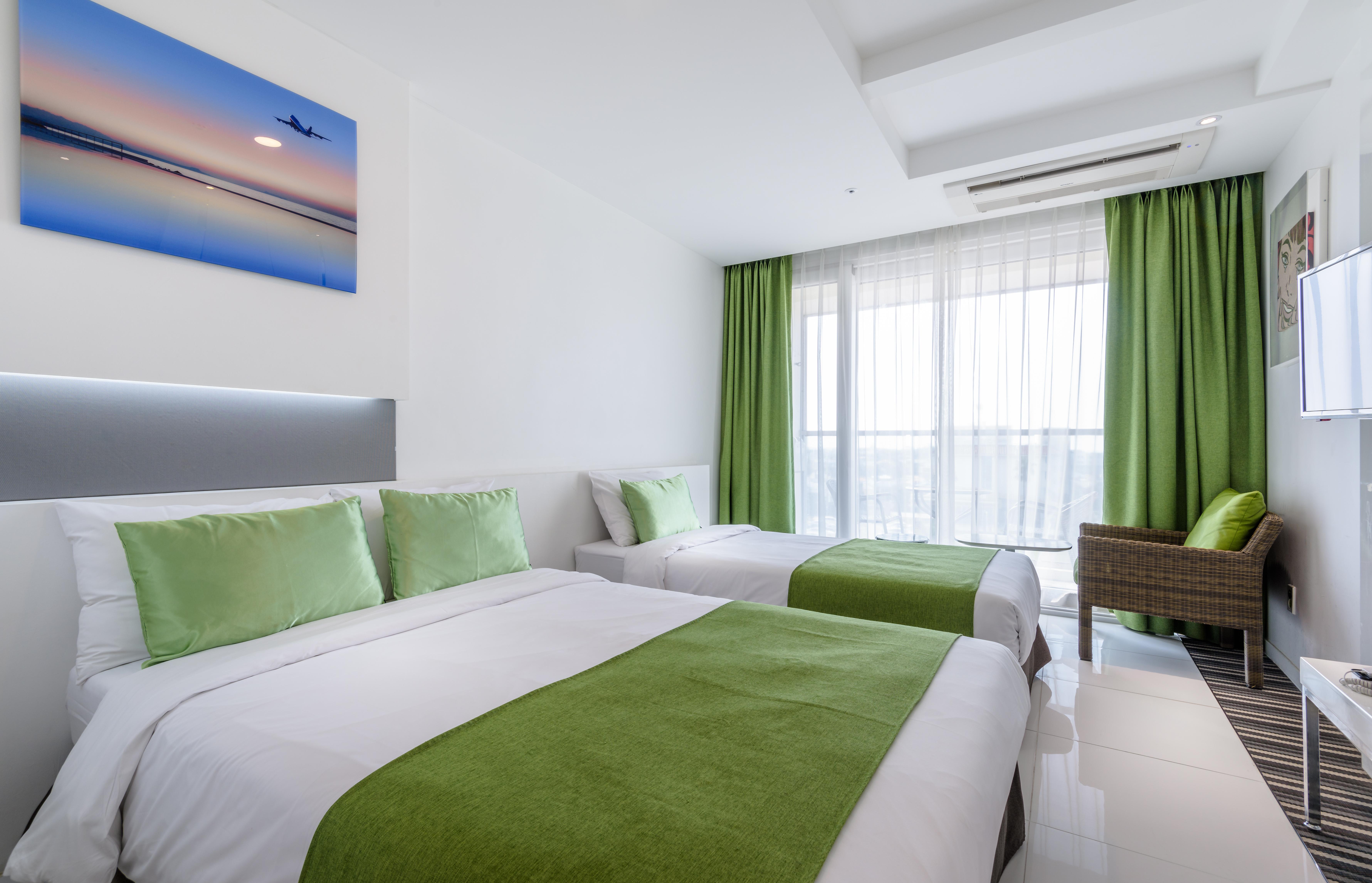 Aimi Jeju Beach Hotel Экстерьер фото