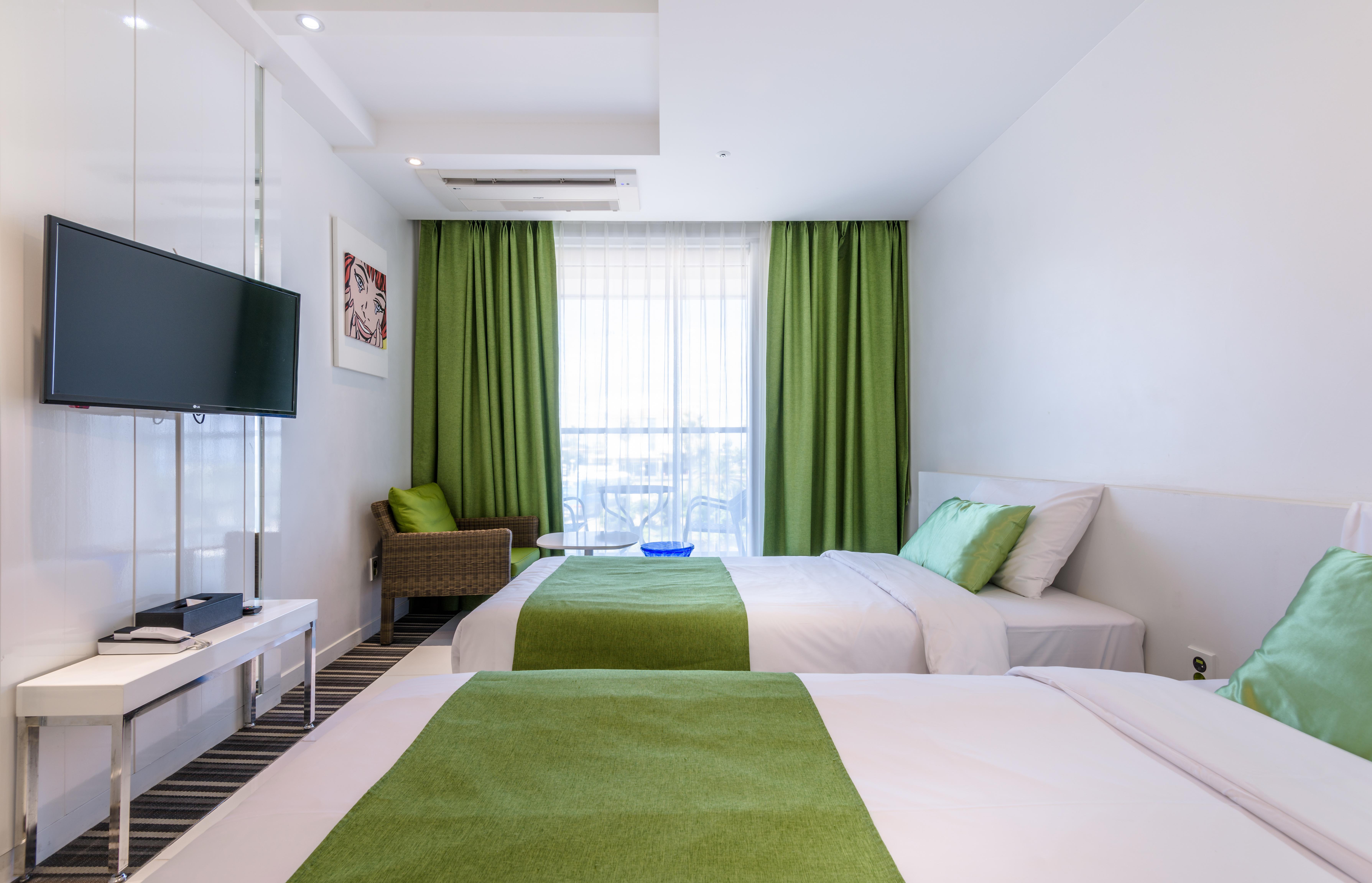 Aimi Jeju Beach Hotel Экстерьер фото